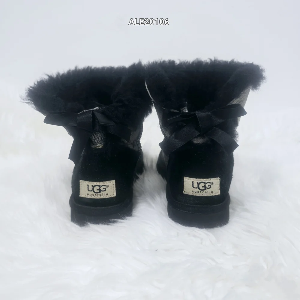 UGG Australia Women's Mini Bailey Bow Snake boots, size 7. - Picture 4 of 13